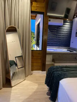 Uma cama ou camas num quarto em Pousada Casa Mariscal