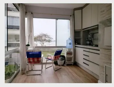 A cozinha ou kitchenette de Apartamento Pe na Areia - Meia praia - Itapema Sc