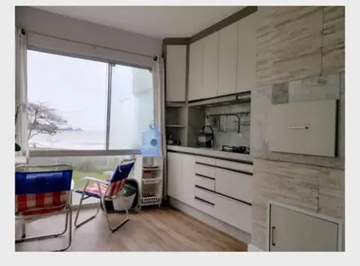A cozinha ou kitchenette de Apartamento Pe na Areia - Meia praia - Itapema Sc