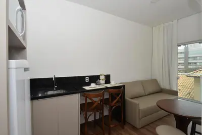 A cozinha ou kitchenette de Vila do Centro Apart Hotel