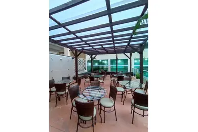 Um restaurante ou outro lugar para comer em Bombinhas Summer Beach