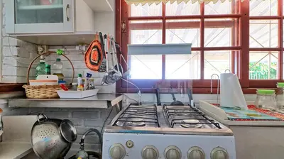 A cozinha ou kitchenette de #005 Casa 2 minutos a pé da praia de Palmas