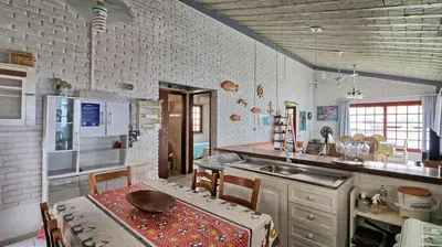A cozinha ou kitchenette de #005 Casa 2 minutos a pé da praia de Palmas