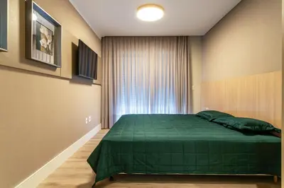 Uma cama ou camas num quarto em Apartamento 308B – Edifício Boulevard em Bombinhas