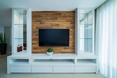 Uma televisão e/ou sistema de entretenimento em Apartamento 308B – Edifício Boulevard em Bombinhas