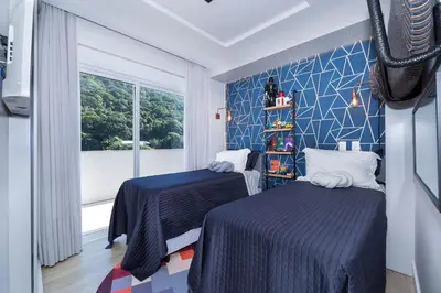 Uma cama ou camas num quarto em Varandas do Atlântico 503B – Frente Mar em Bombas