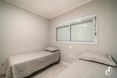 Uma cama ou camas num quarto em Apartamento com 02 dormitórios
