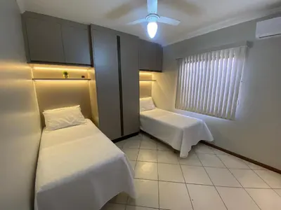 Uma cama ou camas num quarto em Residencial Ribeiro