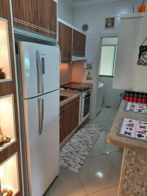 A cozinha ou kitchenette de Amplo e confortável apto a 98 metros da praia de Bombinhas