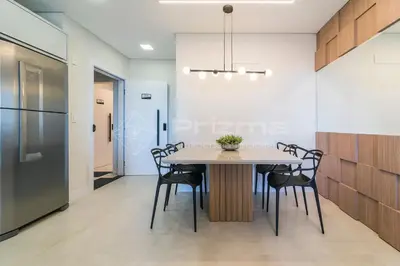 A cozinha ou kitchenette de 301 Bl 01 - WaldGarten Bombinhas - 50 m do Mar e Frente Avenida - Condomínio de Alto Padrão - Piscina - Academia - Salão de jogos