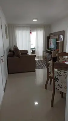 Uma televisão e/ou sistema de entretenimento em Apto temporada Itapema sc