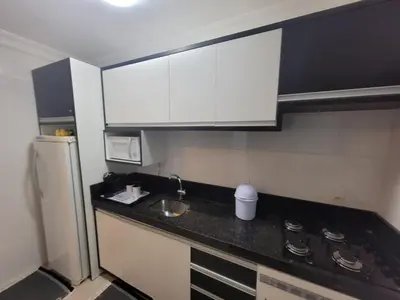 A cozinha ou kitchenette de Apartamento Rota do Mar