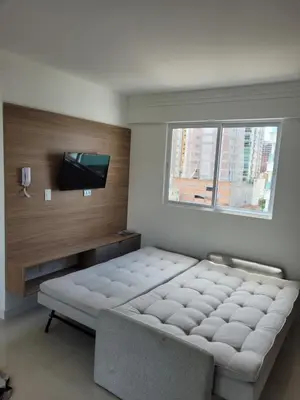 Uma cama ou camas num quarto em Novo Lar 3 Perola do Atlantico
