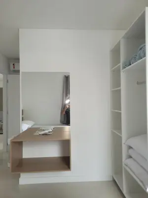 Uma cama ou camas num quarto em Novo Lar 3 Perola do Atlantico