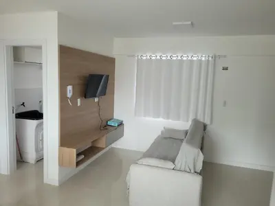 Uma televisão e/ou sistema de entretenimento em Novo Lar 3 Perola do Atlantico
