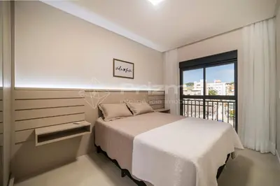 Uma cama ou camas num quarto em 402 Bl 03 Waldgarten Bombinhas - 50 m do Mar - Condomínio de Alto Padrão - Piscina - Academia - Salão de jogos
