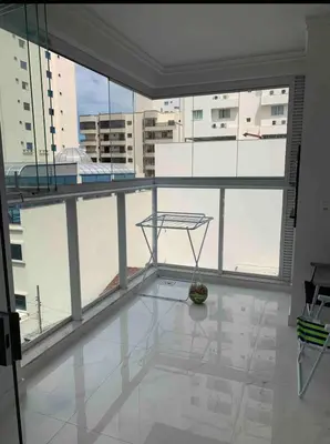 Uma varanda ou terraço em Apartamento 3 suítes a 100m do mar
