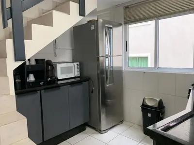 A cozinha ou kitchenette de Ilha de Molokini Centro Bombinhas -SC