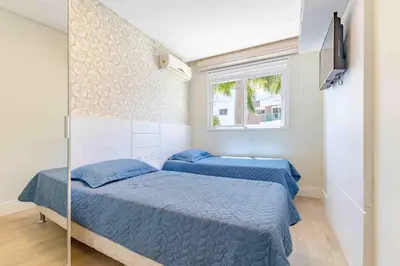 Uma cama ou camas num quarto em Apartamento em Condo com Piscina e Jacuzzi - Boulevard