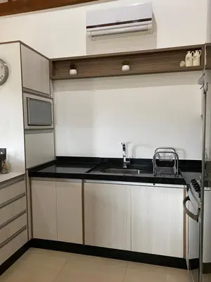 A cozinha ou kitchenette de Studio Recanto Beach Itapema