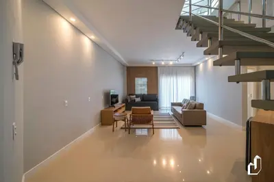 Uma área de estar em Cobertura duplex com vista para o mar e jacuzzi