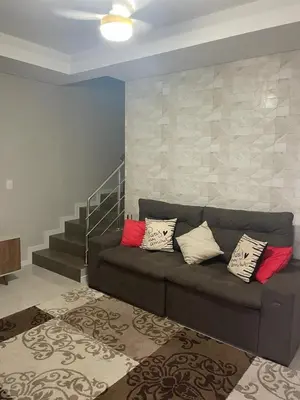 Uma área de estar em Linda casa com jacuzzi e churrasqueira privada para temporada