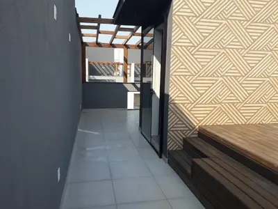 Uma varanda ou terraço em Linda casa com jacuzzi e churrasqueira privada para temporada
