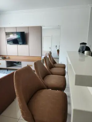 Uma área de estar em Apartamento Balneário Camboriú