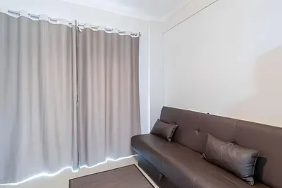 Uma área de estar em Apto 230m da Praia de Bombas - 2 dorms 4 pessoas