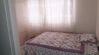 Uma cama ou camas num quarto em Apartamento quadra mar