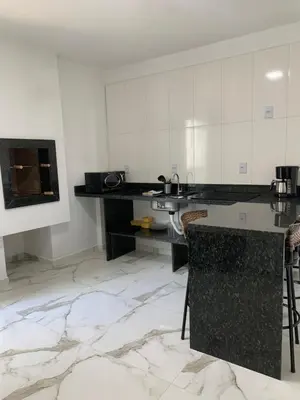 A cozinha ou kitchenette de Nino's Residence - 150m da Praia de Mariscal