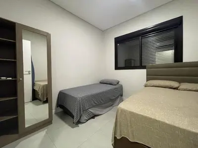 Uma cama ou camas num quarto em Anito Petry Residence - Apto para 7 pessoas na Praia de Palmas