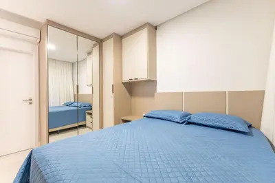 Uma cama ou camas num quarto em Porto Madero - Apartamento em Condomínio com Piscina e Academia