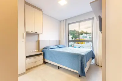 Uma cama ou camas num quarto em Porto Madero - Apartamento em Condomínio com Piscina e Academia