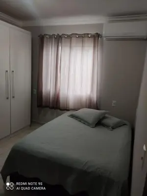 Uma cama ou camas num quarto em Casa amanda