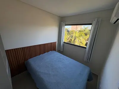 Uma cama ou camas num quarto em Residencial Brisa do Mar