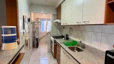 A cozinha ou kitchenette de Apto Almeida e Moraes Pé na Areia BC 2 vagas de garagem