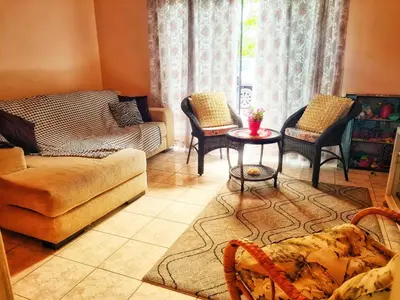 Uma área de estar em Casa de praia no Estaleirinho Balneário Camboriú