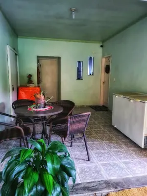 Uma área de estar em Casa de praia no Estaleirinho Balneário Camboriú