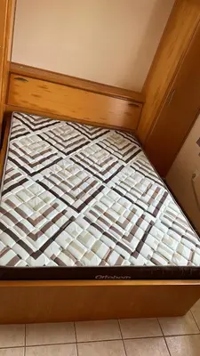 Uma cama ou camas num quarto em AP com Piscina em Porto Belo