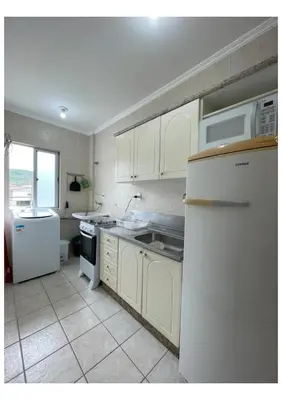 A cozinha ou kitchenette de AP com Piscina em Porto Belo
