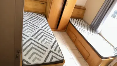Uma cama ou camas num quarto em AP com Piscina em Porto Belo