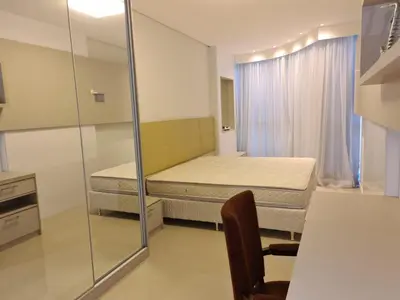 Uma cama ou camas num quarto em Cobertura com Piscina 50 mt do Mar