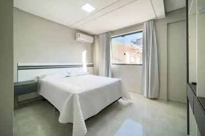 Uma cama ou camas num quarto em Residencial Florida Premium