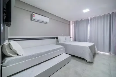 Uma cama ou camas num quarto em Residencial Florida Premium