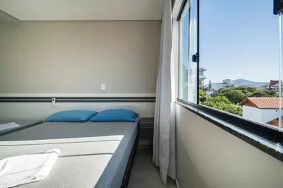 Uma cama ou camas num quarto em Residencial Florida Premium