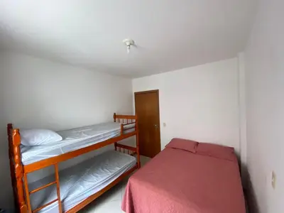 Uma cama ou camas num quarto em Apartamento Aconchegante