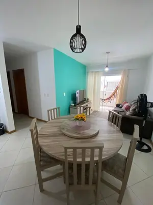 Uma área de estar em Apartamento Aconchegante
