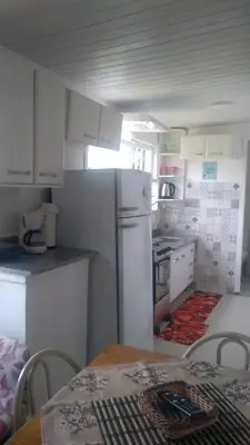 A cozinha ou kitchenette de Hospede Mar Bombinhas