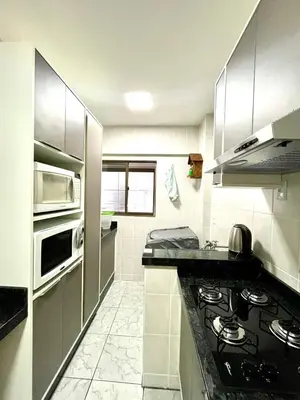 A cozinha ou kitchenette de Apto Meia Praia/Itapema